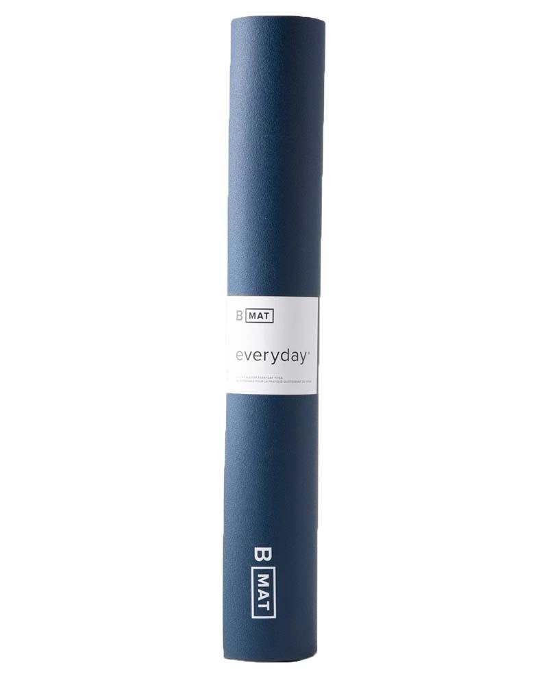 Blue yoga mat with 'B MAT' branding on a white background